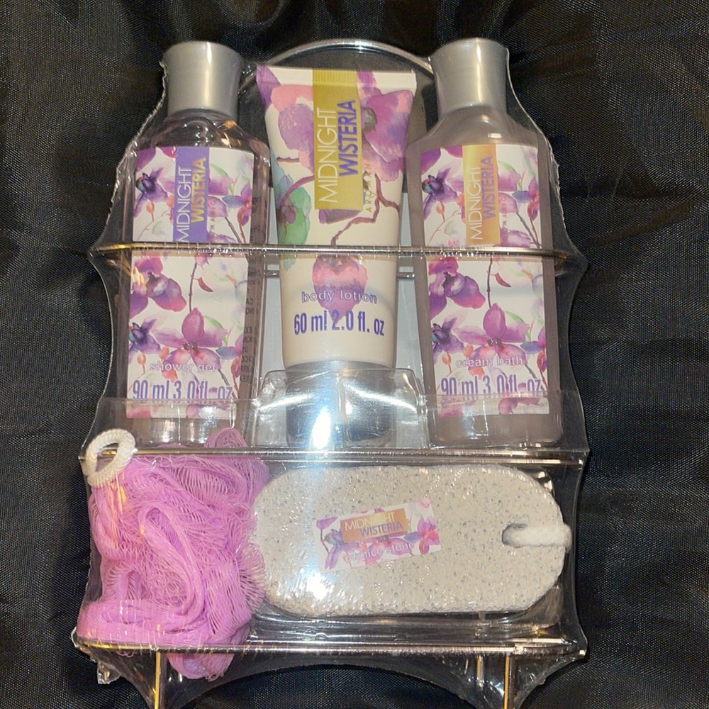 Wisteria shower set in a silver hanging wire rack.